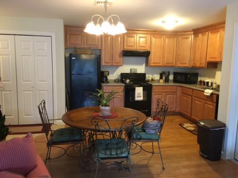 Open concept kitchen/dining/living area